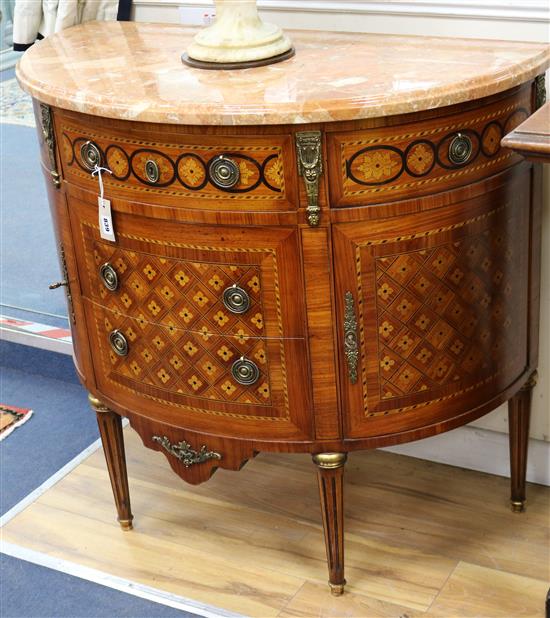 A Louis XVI design marquetry inlaid demi lune marble top commode W.97cm